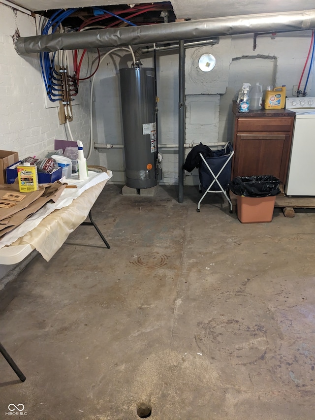 basement featuring washer / dryer and gas water heater