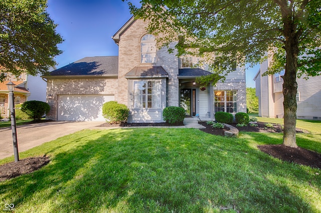 front facade with a front lawn and a garage