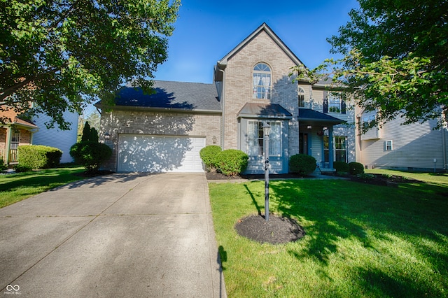 front facade with a garage and a front lawn