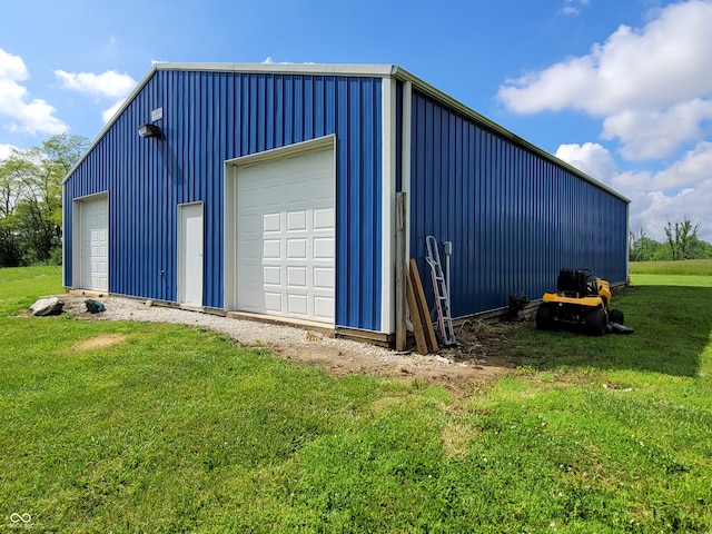 garage featuring a yard