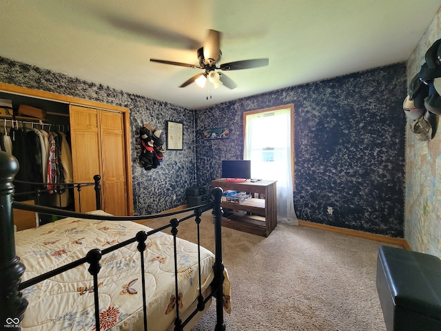 bedroom featuring a closet, carpet, and ceiling fan