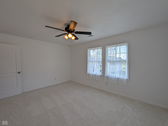 unfurnished room featuring carpet flooring and ceiling fan