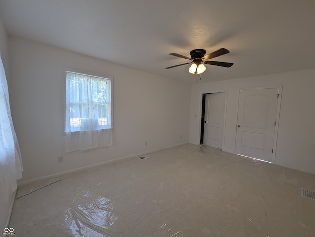 unfurnished room featuring carpet flooring and ceiling fan