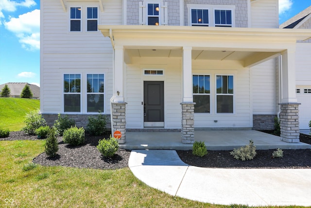 entrance to property with a yard