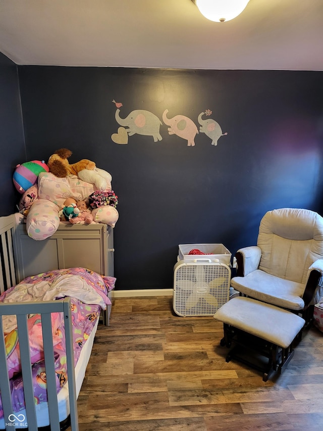 715 5th St, Covington, IN 47932 - bedroom with baseboards and wood finished floors