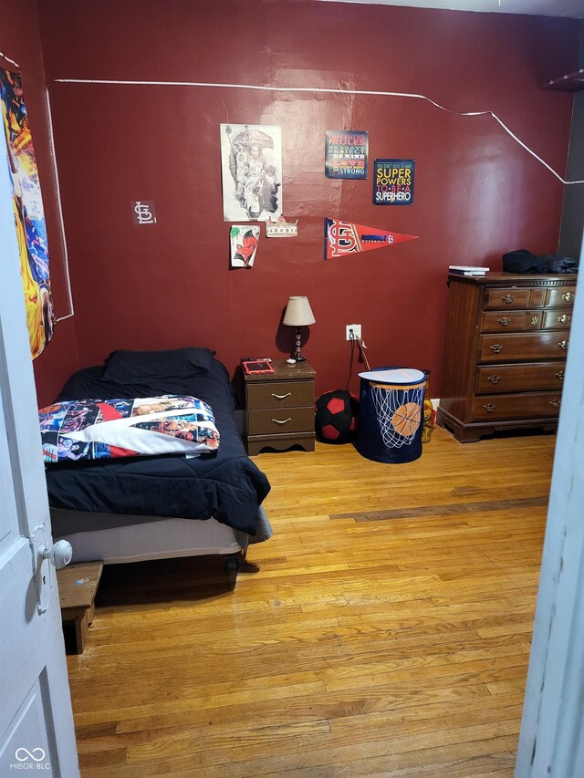 715 5th St, Covington, IN 47932 - bedroom featuring wood finished floors