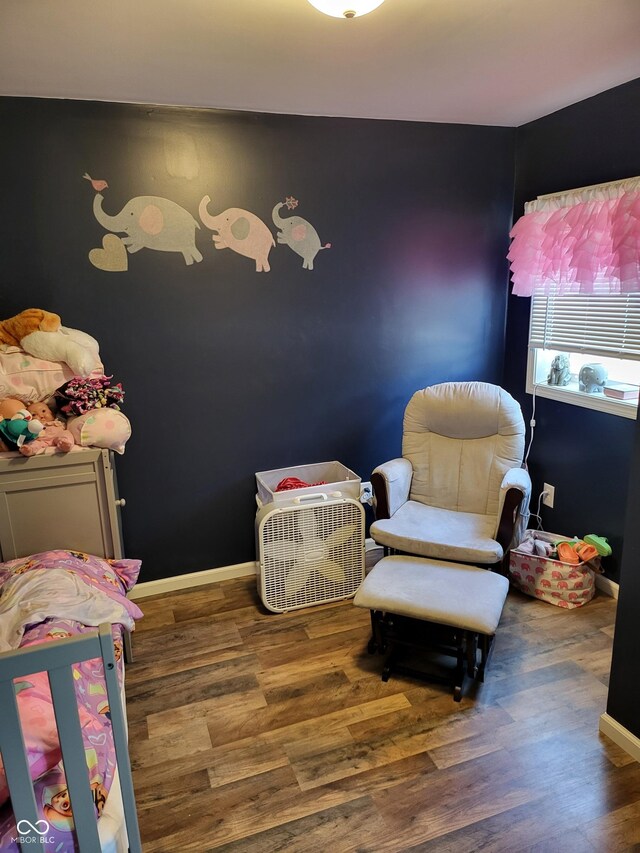 715 5th St, Covington, IN 47932 - bedroom with baseboards and wood finished floors