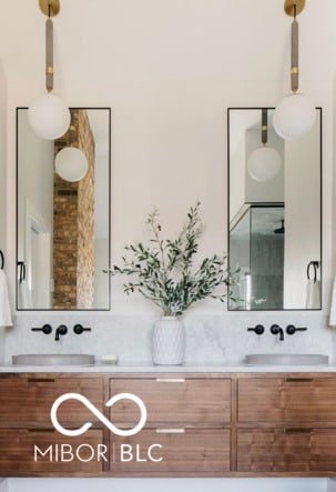 bathroom with dual bowl vanity