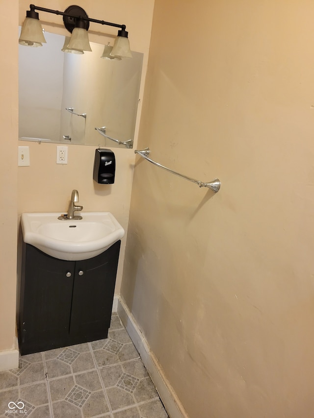 bathroom featuring vanity and tile floors