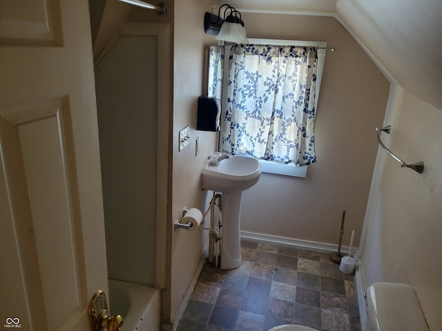 full bathroom featuring toilet, tile flooring, shower / bathtub combination, sink, and lofted ceiling