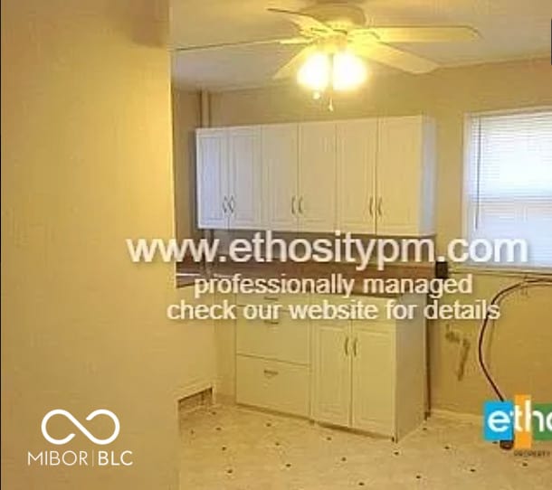 interior space featuring a ceiling fan