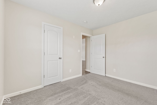 spare room with carpet flooring