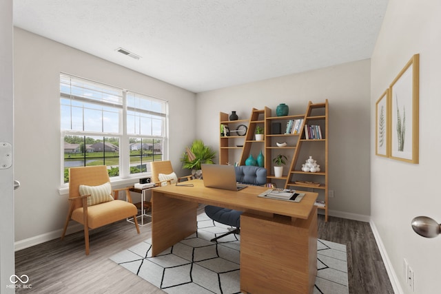 office area featuring a textured ceiling and hardwood / wood-style flooring