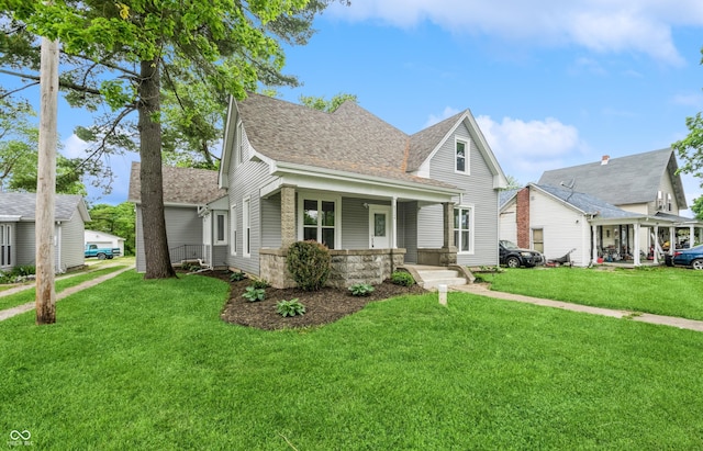 view of front of home with a front yard