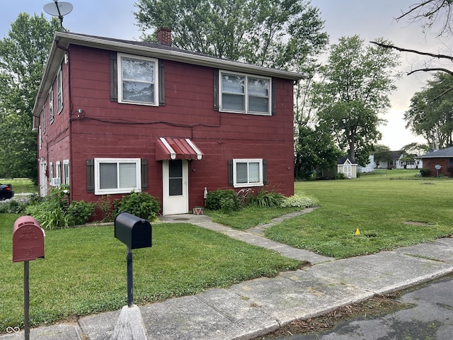 view of front of property with a front yard