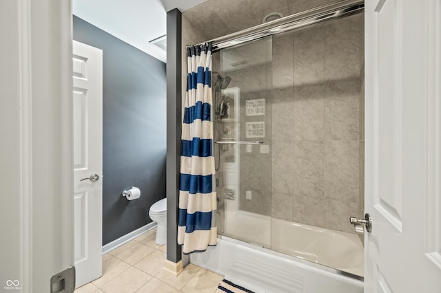 bathroom featuring tile patterned flooring, toilet, and shower / tub combo