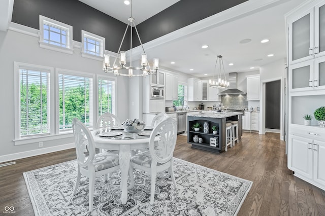 dining room featuring dark hardwood / wood-style floors and sink