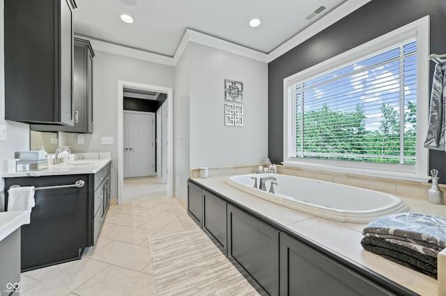 bathroom with tile patterned flooring, vanity, a tub, and ornamental molding