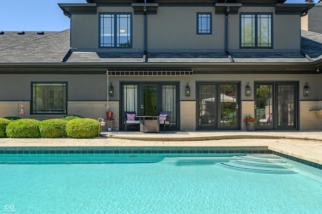 back of house with a patio area