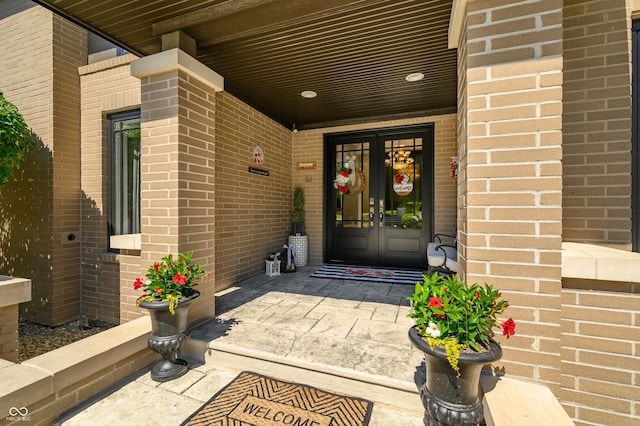 entrance to property featuring french doors