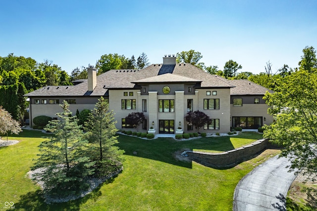 view of front of home with a front yard