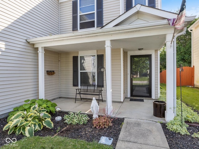 doorway to property featuring a porch