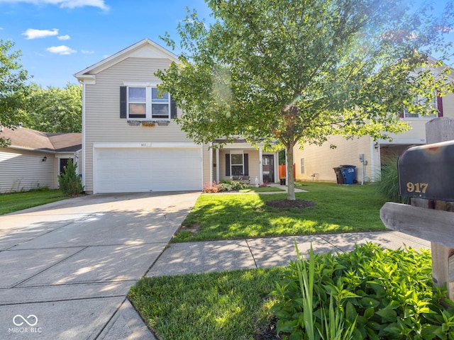 view of front of house featuring a garage and a front yard