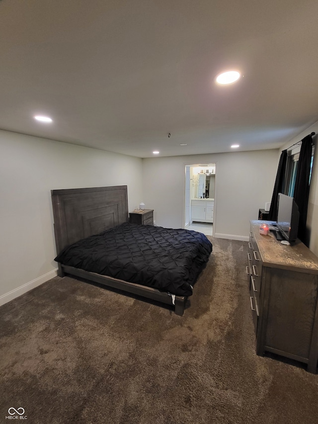 bedroom with dark carpet