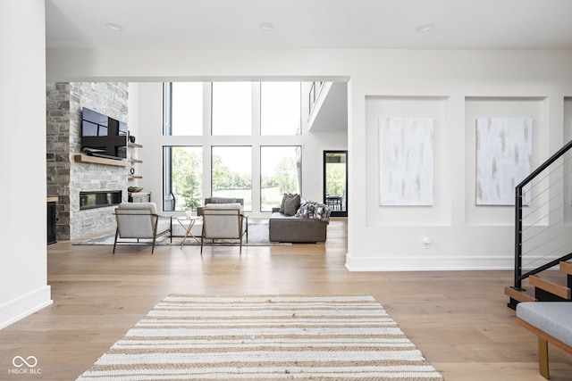 interior space featuring light hardwood / wood-style floors and a fireplace