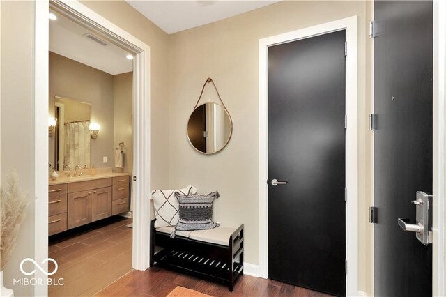 interior space featuring dark tile floors