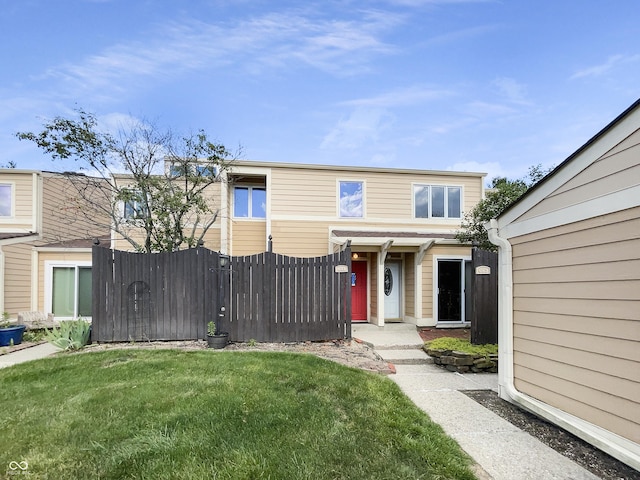 view of front of property with a front lawn