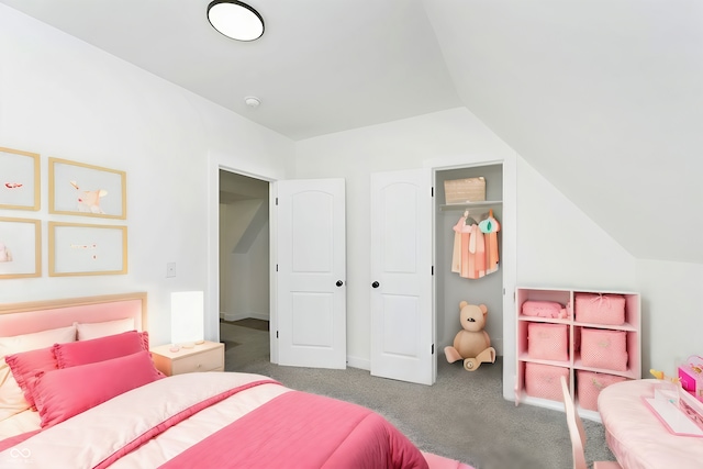 carpeted bedroom with lofted ceiling