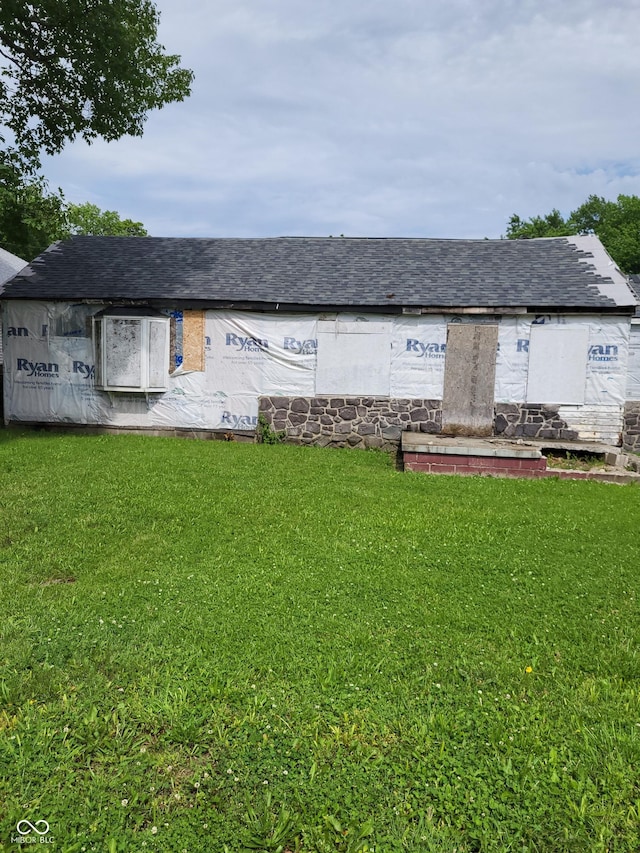 exterior space with a lawn