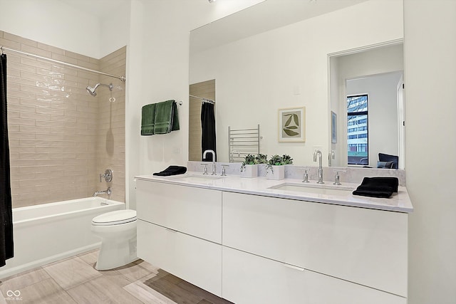 full bathroom featuring vanity, toilet, and shower / bathtub combination with curtain