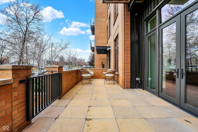 balcony featuring french doors