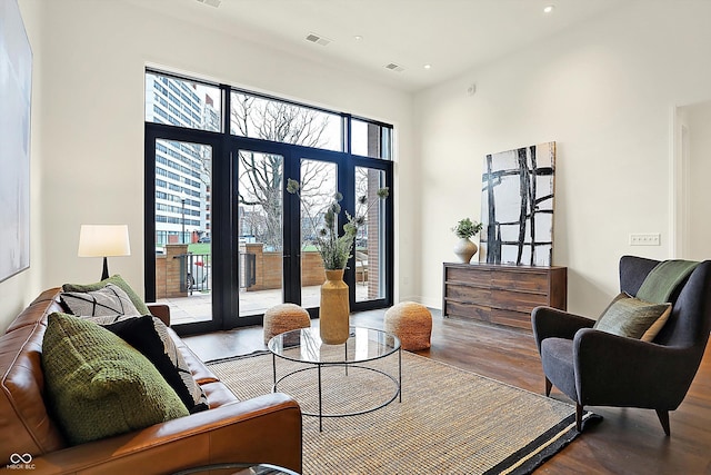 living room featuring hardwood / wood-style floors and french doors