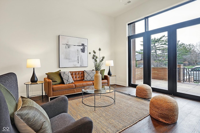 living room with light hardwood / wood-style flooring