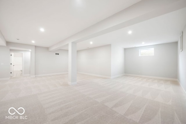 basement with light colored carpet