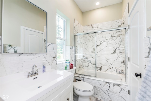 full bathroom with vanity, decorative backsplash, enclosed tub / shower combo, and toilet