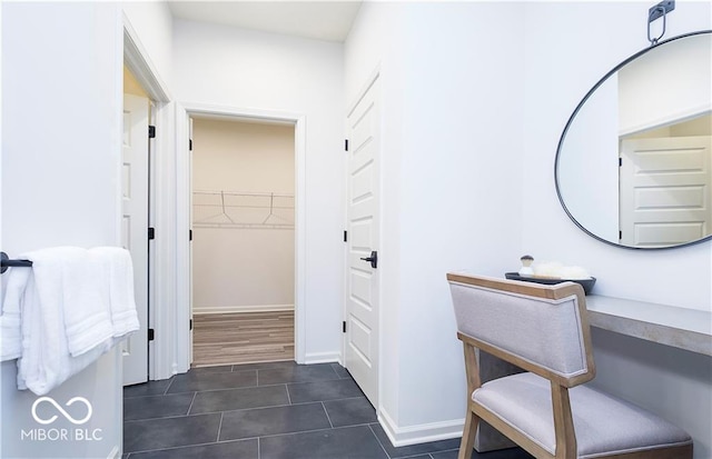 bathroom with tile patterned floors