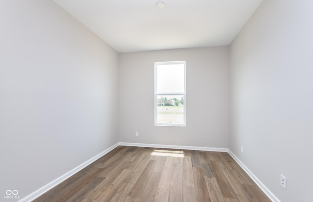 spare room featuring light wood-type flooring