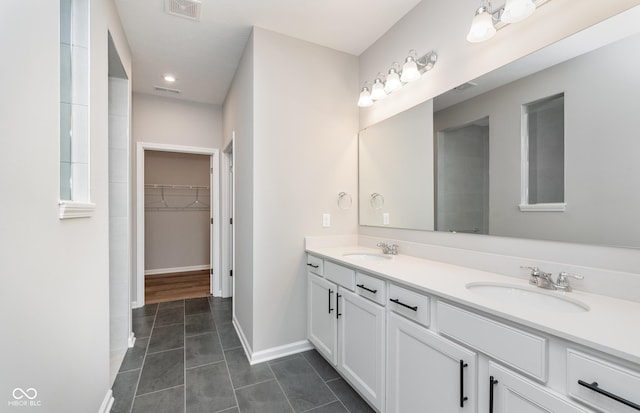 bathroom featuring vanity and tile patterned floors