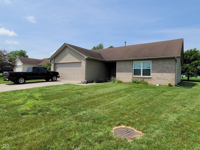 single story home with a front yard and a garage