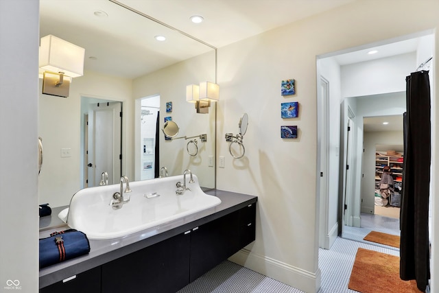 bathroom with vanity and tile patterned floors