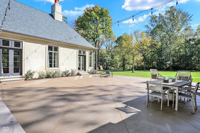 view of patio featuring french doors