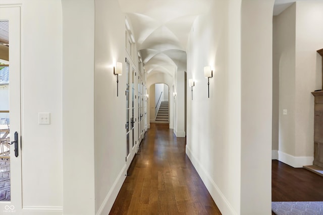 corridor featuring dark wood-type flooring