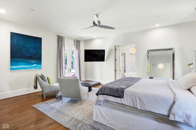 bedroom with wood-type flooring, ensuite bathroom, and ceiling fan