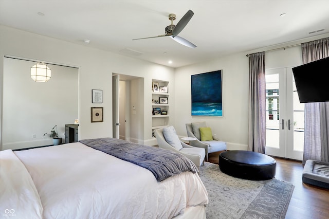 bedroom featuring hardwood / wood-style flooring, ceiling fan, french doors, and access to outside