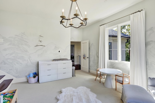 interior space featuring light colored carpet and a notable chandelier