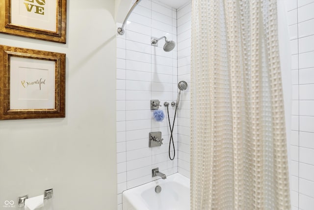 bathroom featuring shower / tub combo